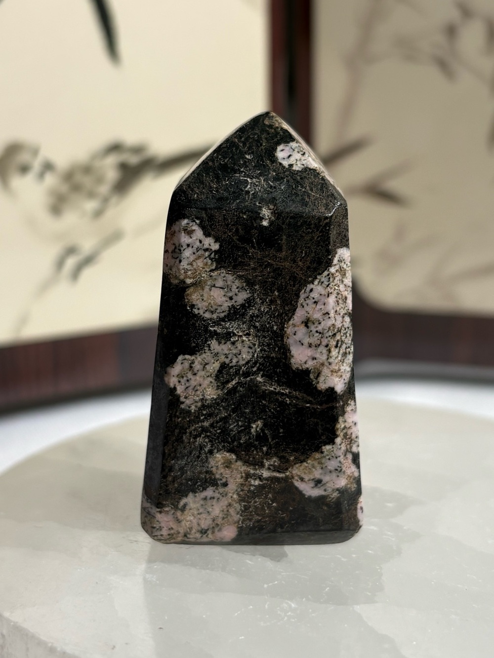 Pink thulite and black jade tower
